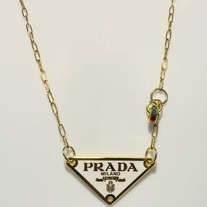 Gold Necklace with White Pendant and Multicolor Charm